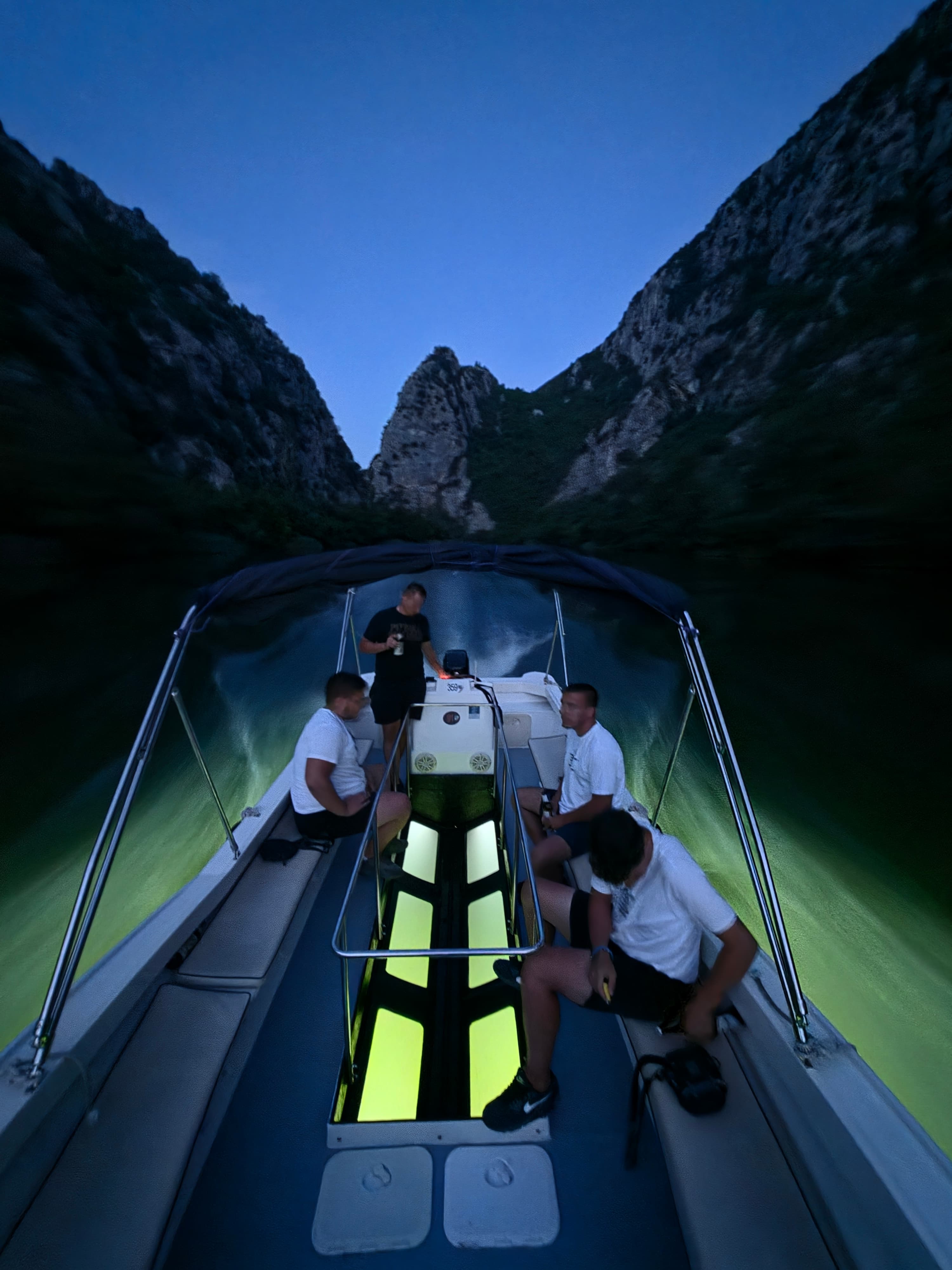 Glass boat in the canyon at night